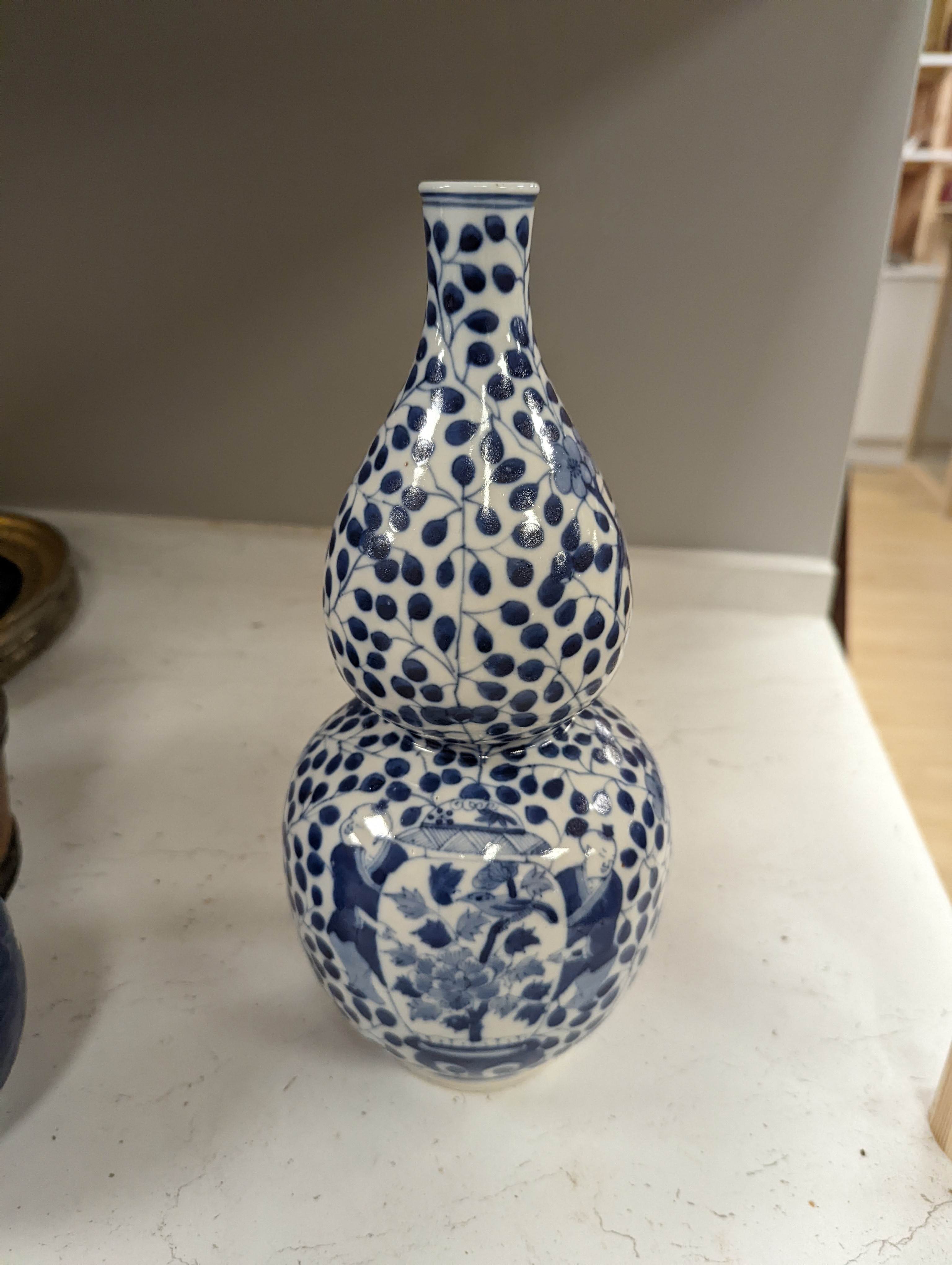 Two Chinese blue and white vases, tallest 29cm